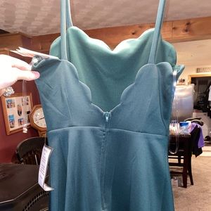 dark green dress.never worn. tags still on.
